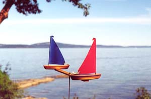 model sailboat garden ornament whirlygig two model sailboats that spin in the wind, a fun whirlygig